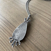 Sacred Bones Silver Pendant - Petrified Palm Root Necklace