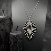 Halo of Bones Silver Pendant Necklace - Petrified Palm Root